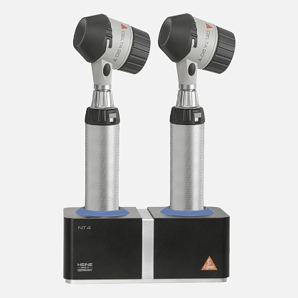 Two HEINE DELTA 20 T dermatoscopes, two rechargeable handles BETA4 NT, NT4 desktop charger